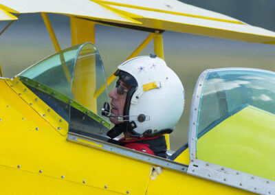 close up of pilot in trick plane